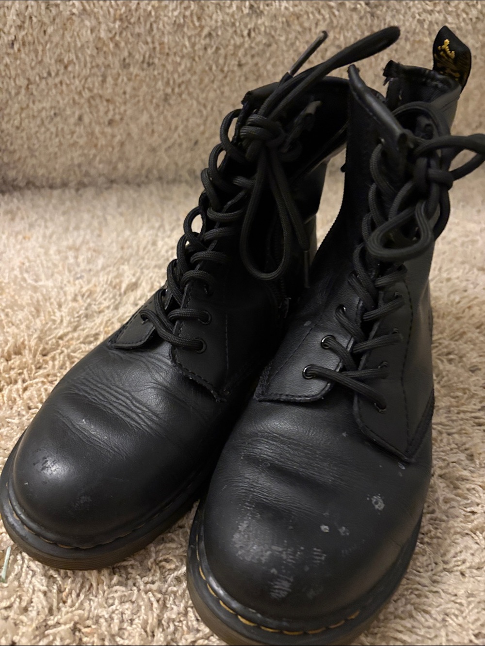 Dr. Martens Black Leather Ankle Boots with Yellow Heel Loop